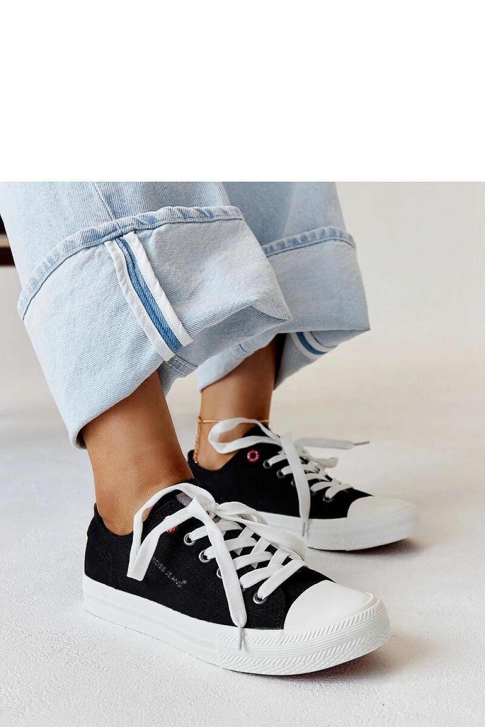 black lace sneakers front view