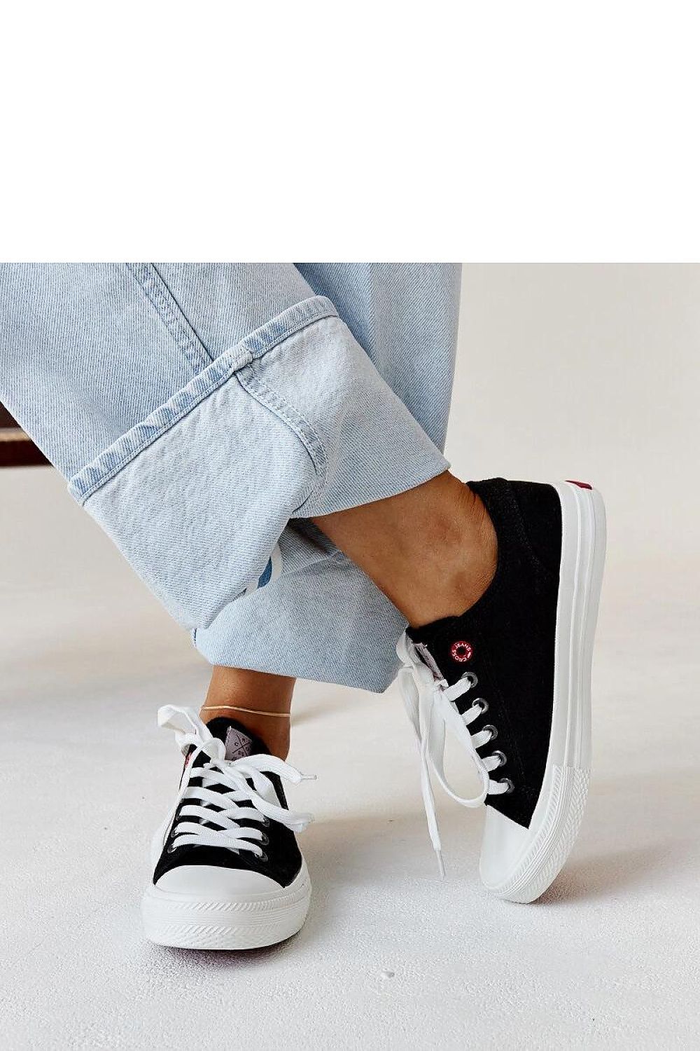 black lace sneakers back view