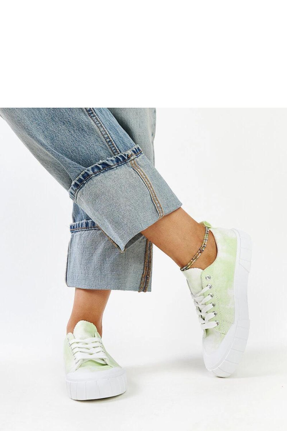 green lace sneakers detail view
