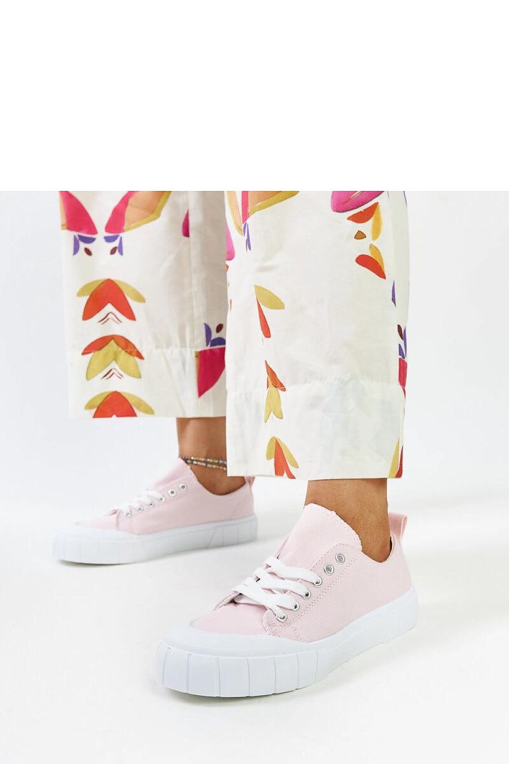 pink lace sneakers detail view