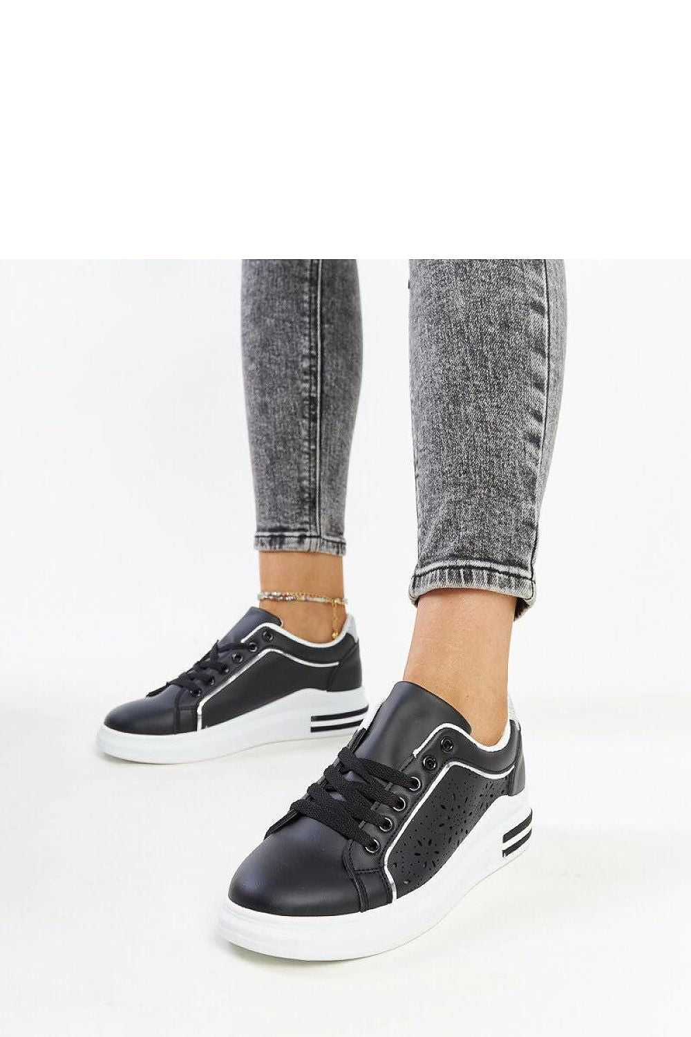 black lace sneakers detail view
