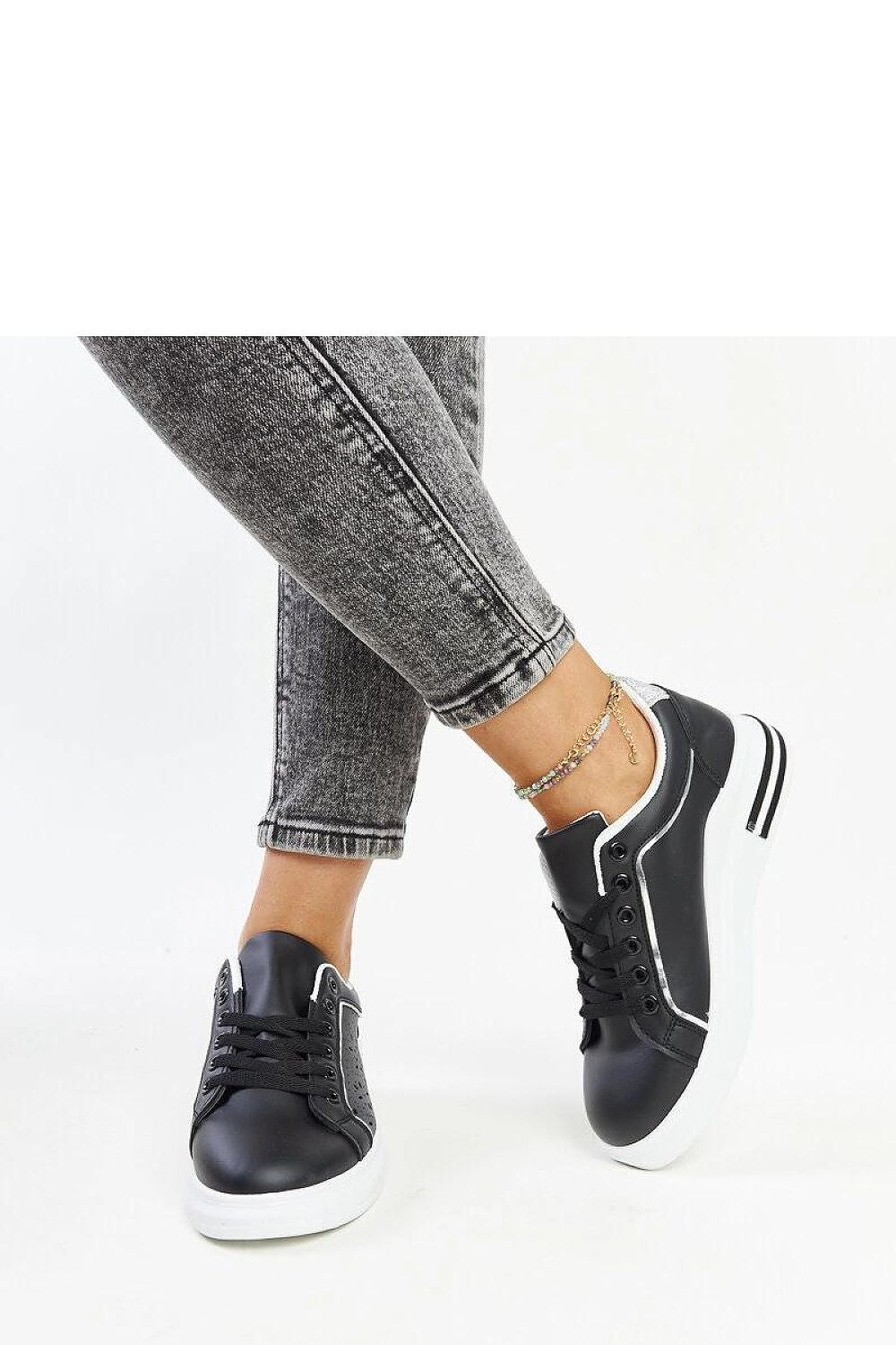 black lace sneakers back view