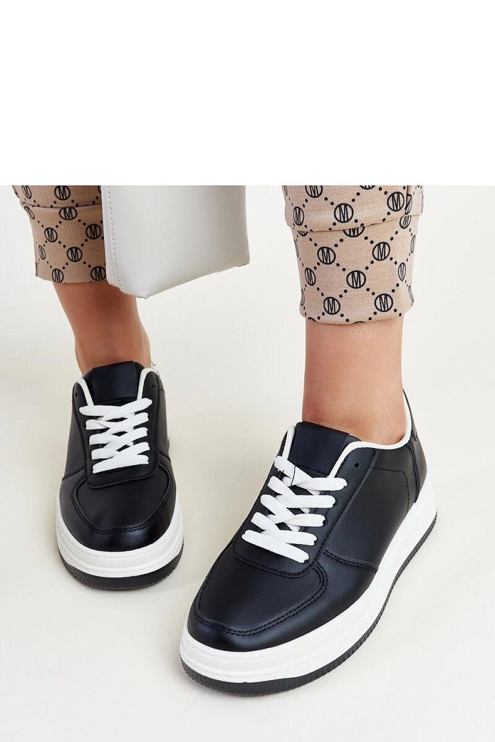 black lace sneakers back view