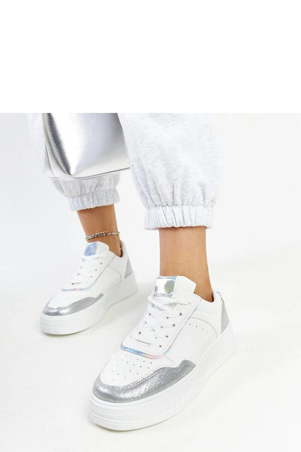 white lace sneakers detail view