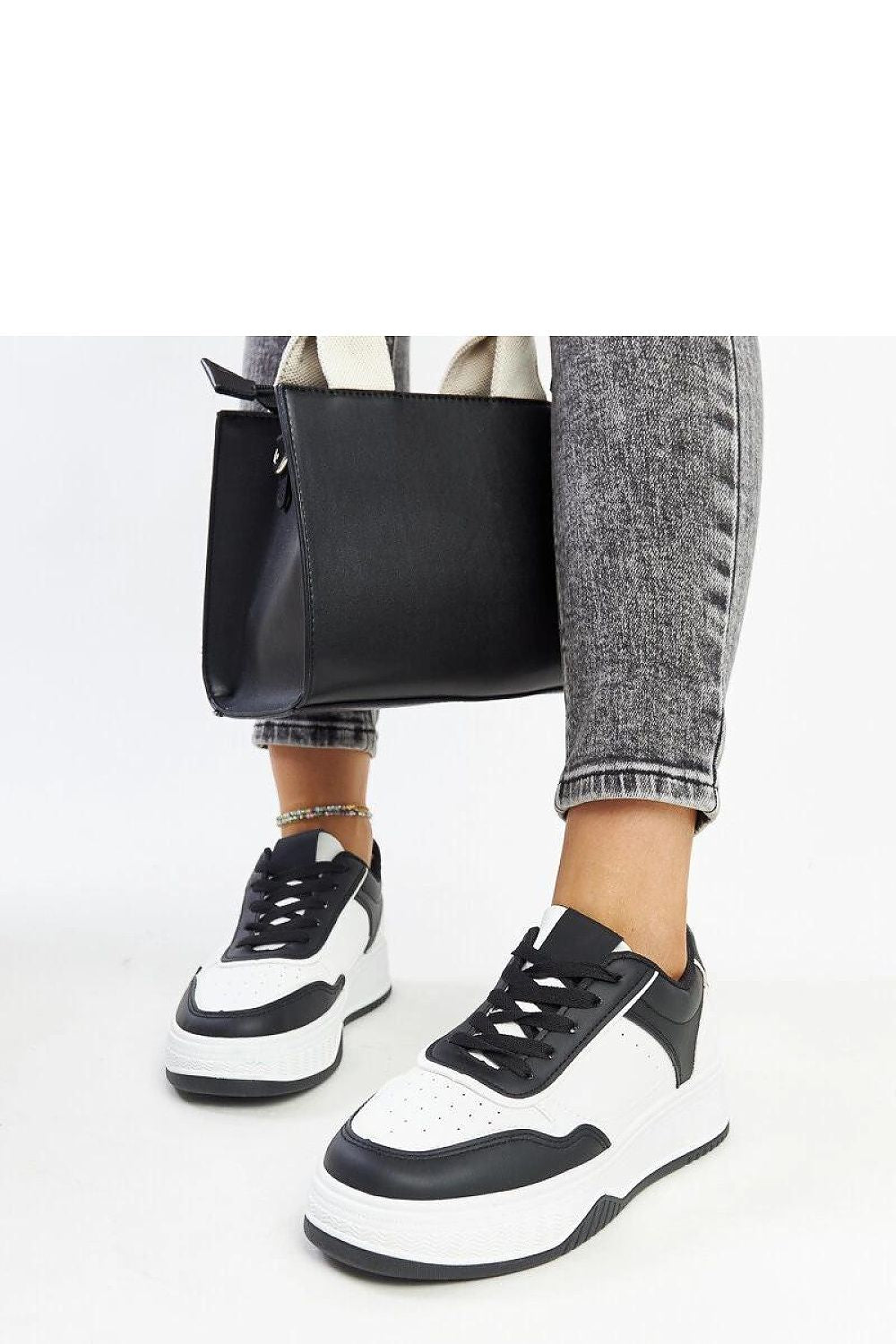 white lace sneakers detail view