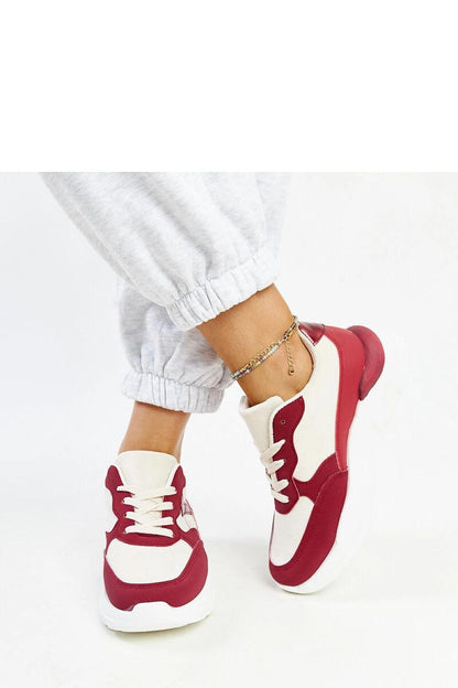 red lace sneakers detail view