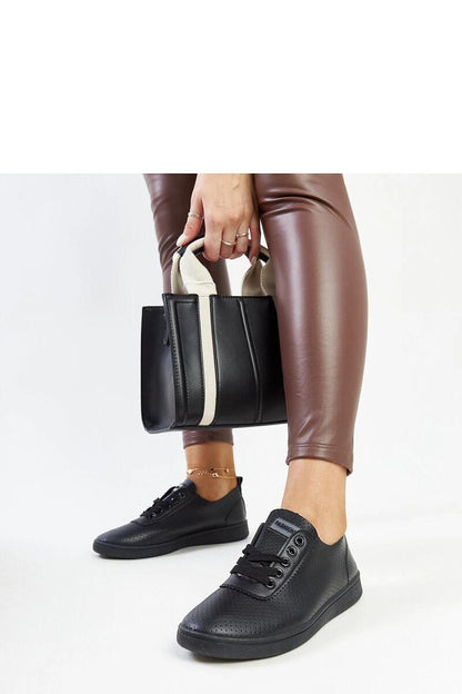 black lace sneakers detail view