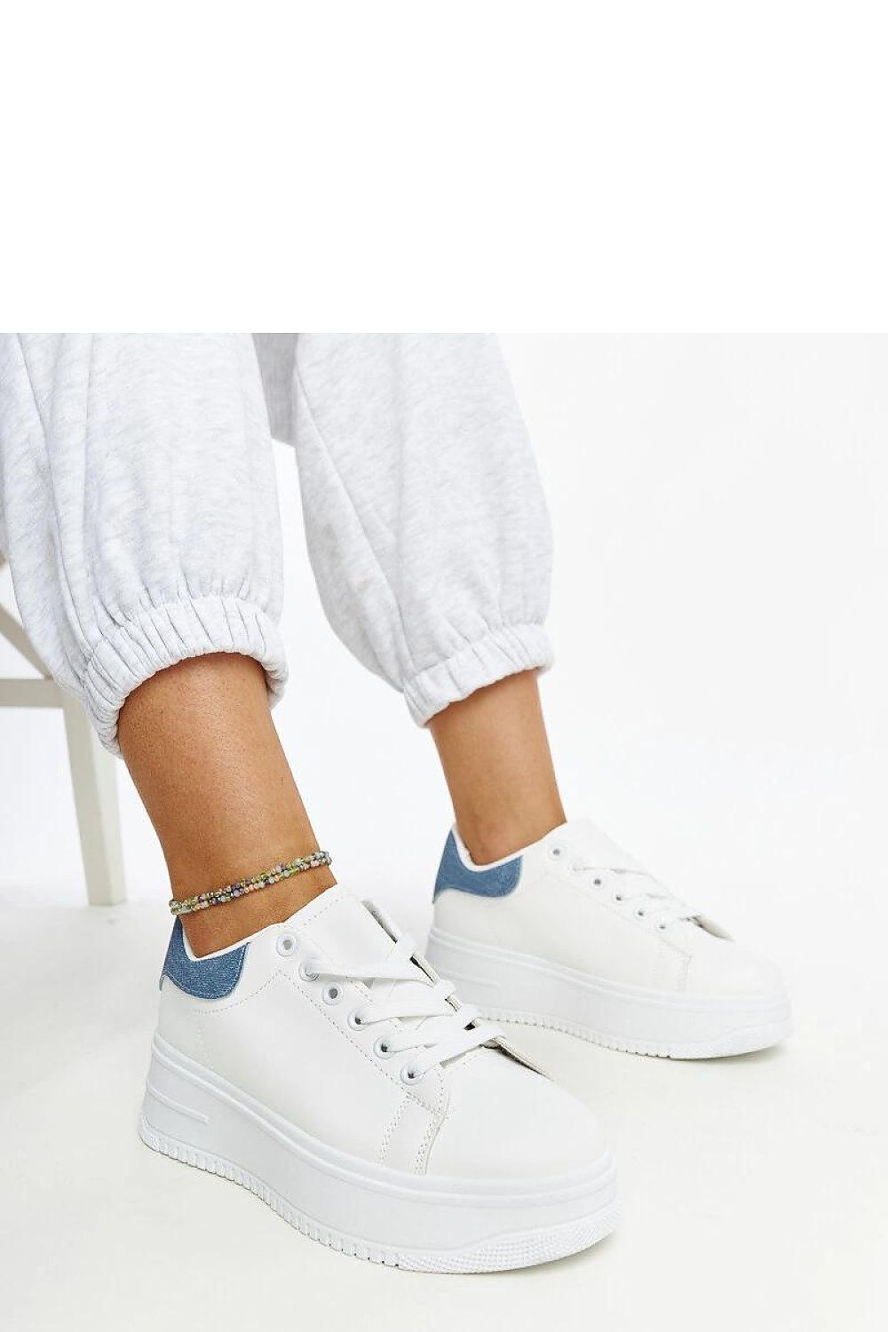 white lace sneakers front view