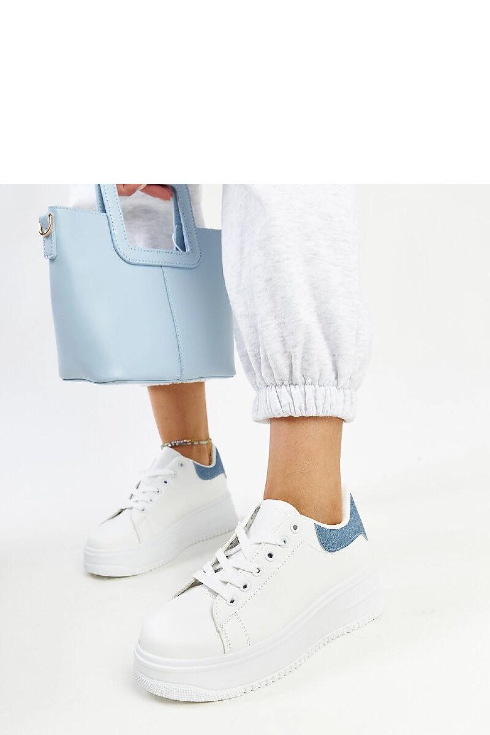 white lace sneakers detail view