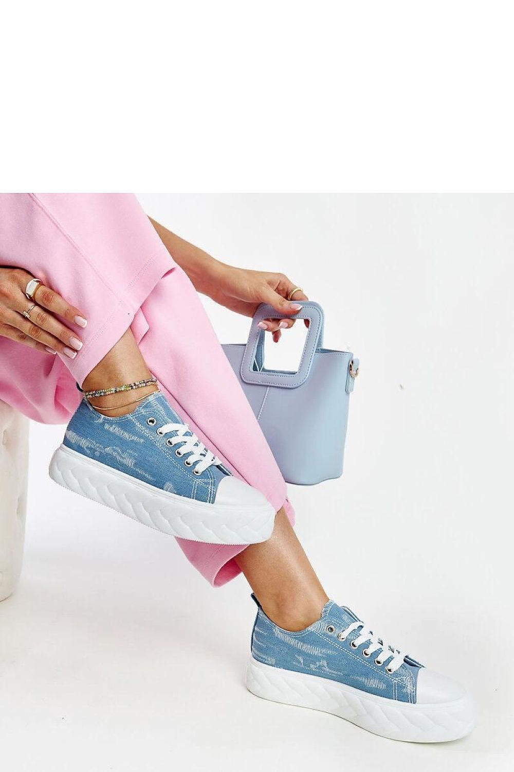 blue lace sneakers detail view