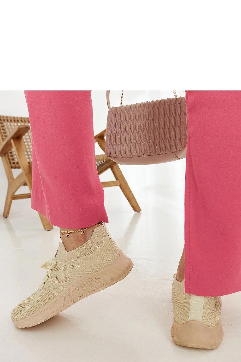 beige sneakers back view