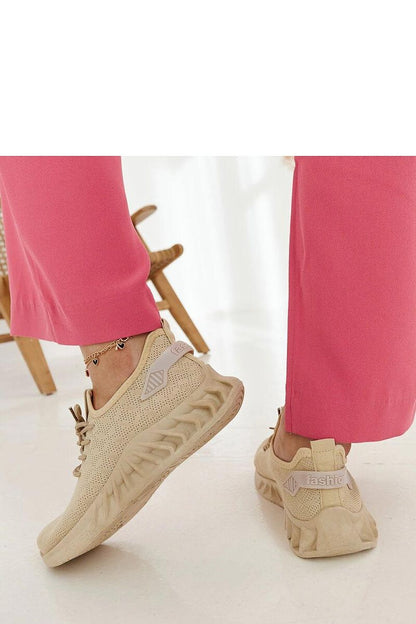 beige sneakers back view