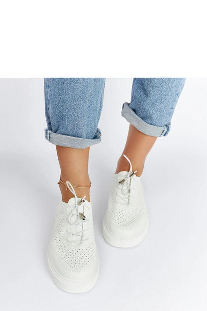 white sneakers back view