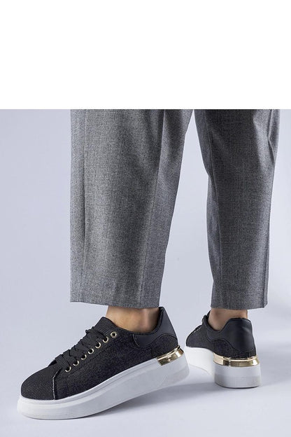 black sneakers detail view