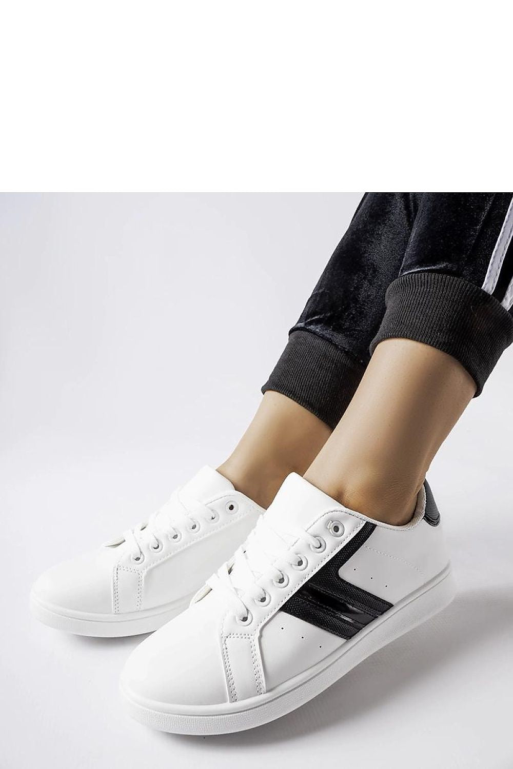 white sport shoes alternate angle