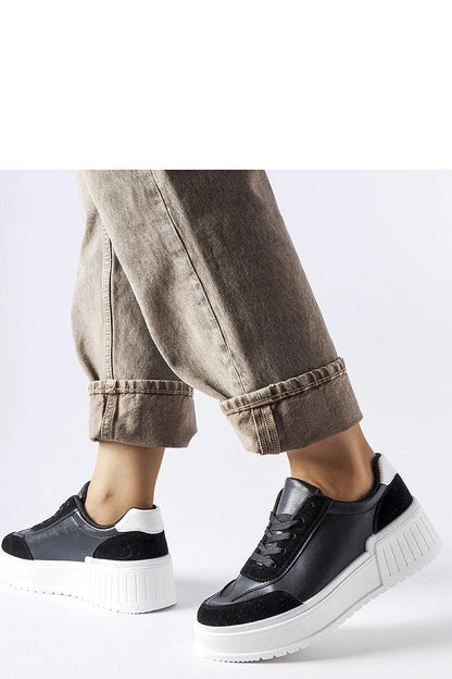 black sneakers front view