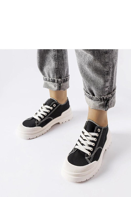 black sneakers front view