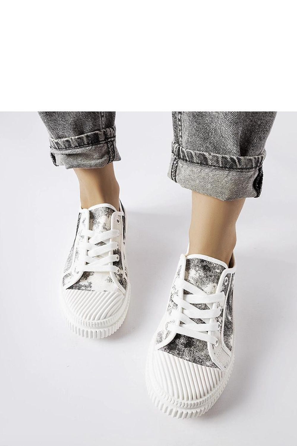 black lace sneakers detail view