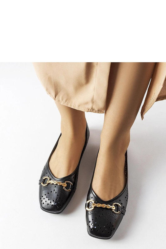 black ballet flats front view