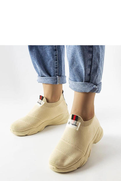 beige sport shoes front view