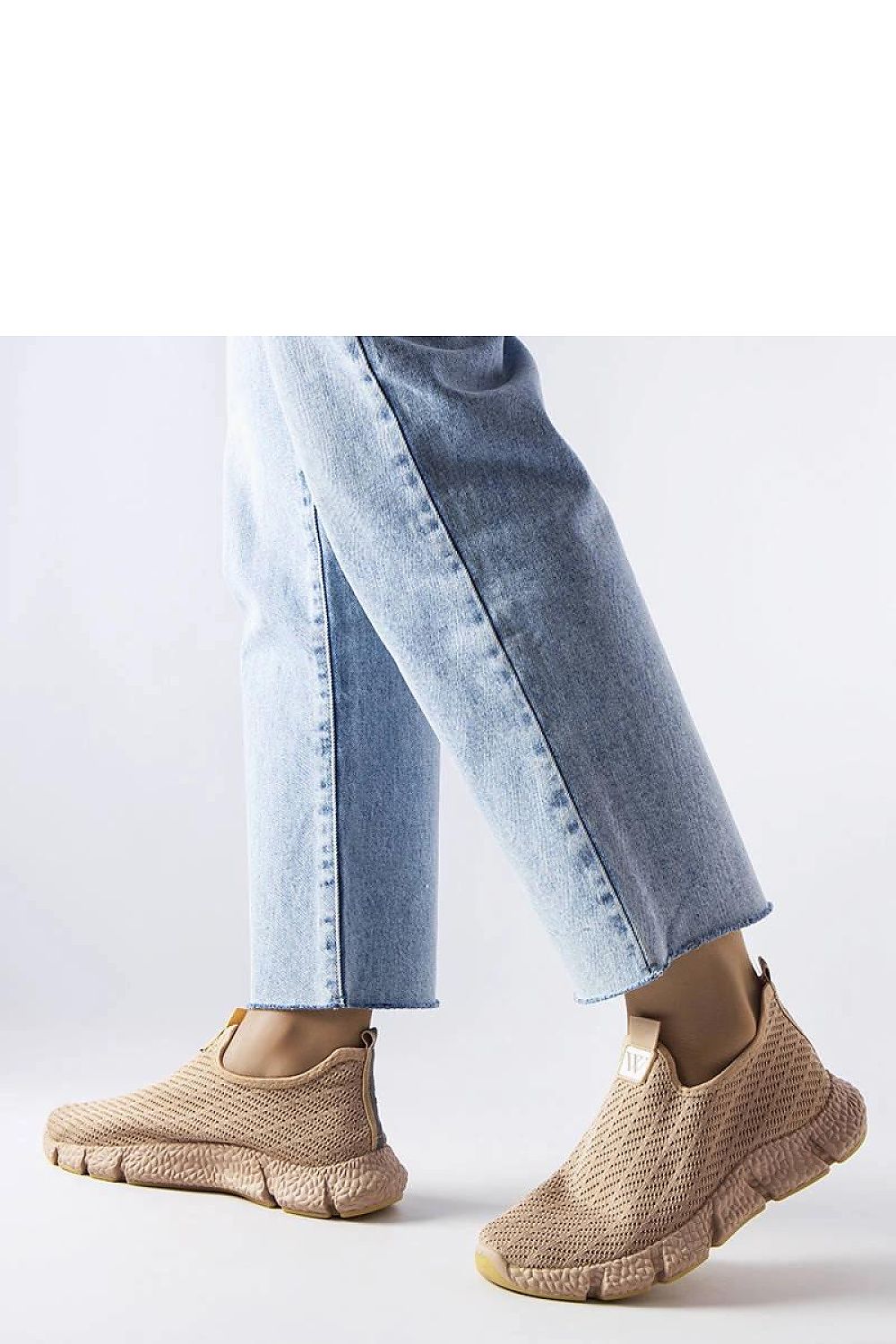 beige sport shoes front view