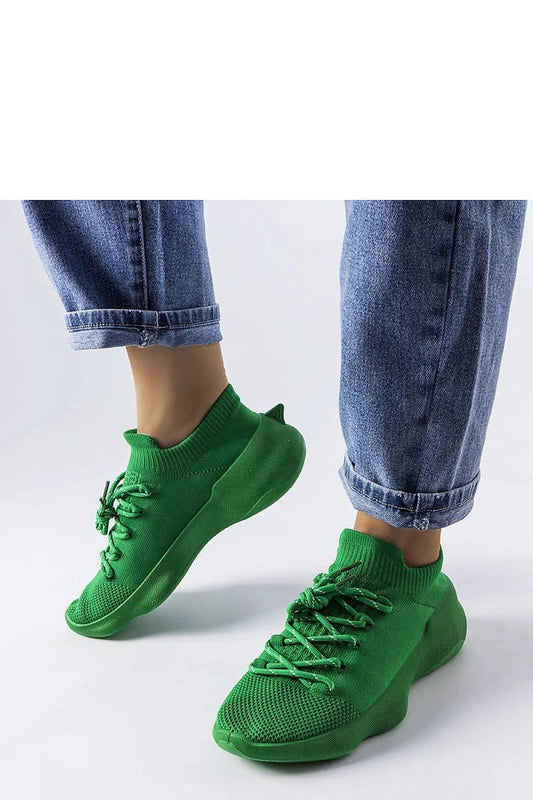 green sneakers front view