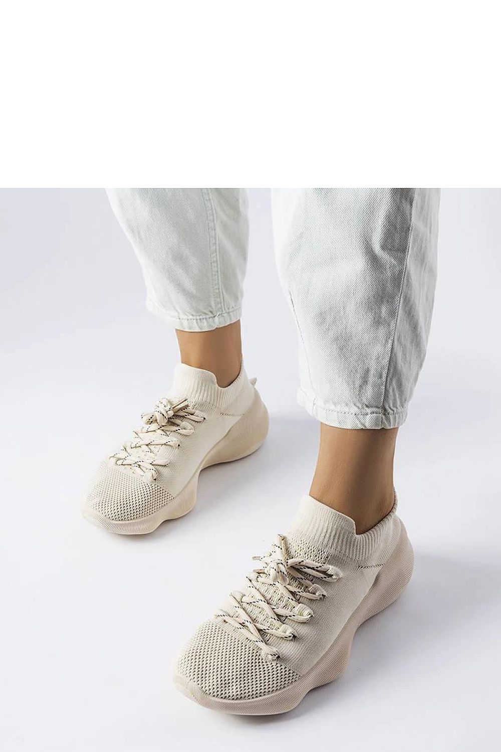 green sneakers back view