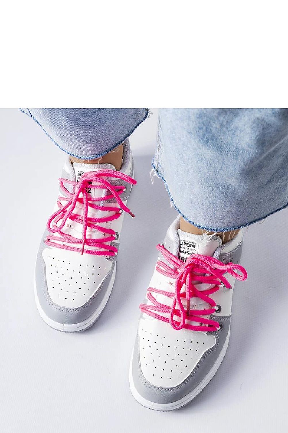 white lace sneakers detail view