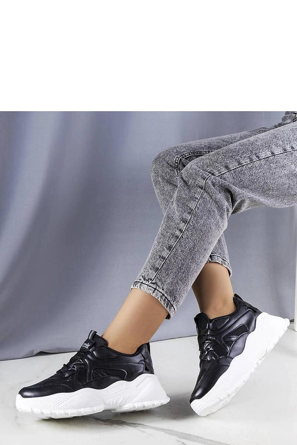 black sneakers front view