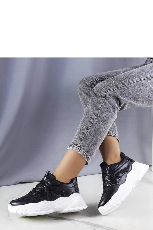 black sneakers front view