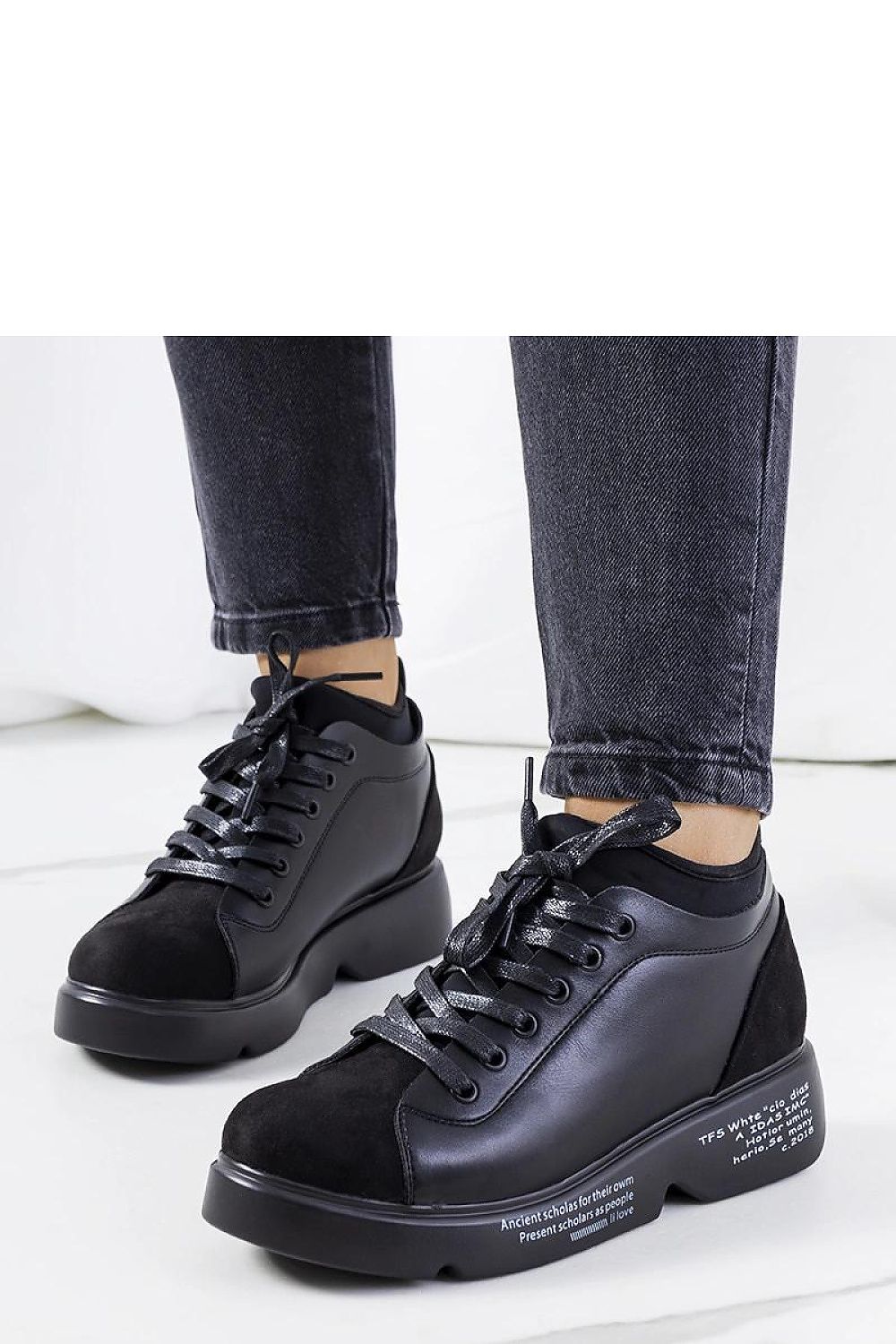 black sneakers front view