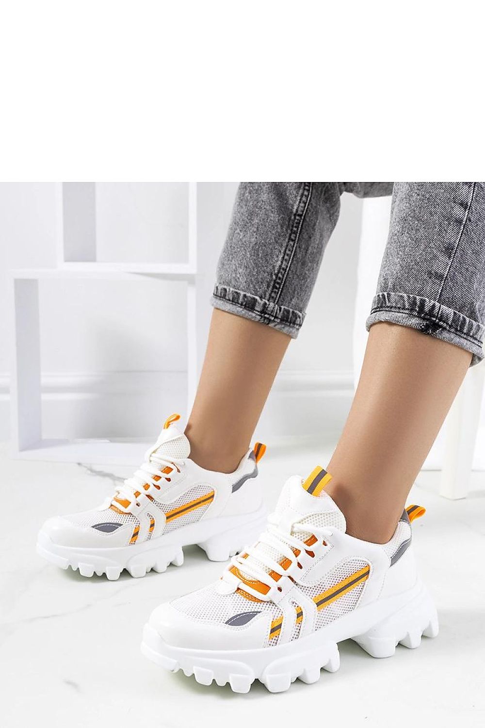 white lace sneakers detail view