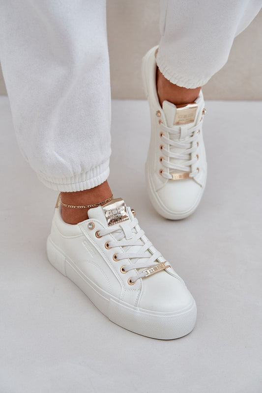 white sport shoes front view