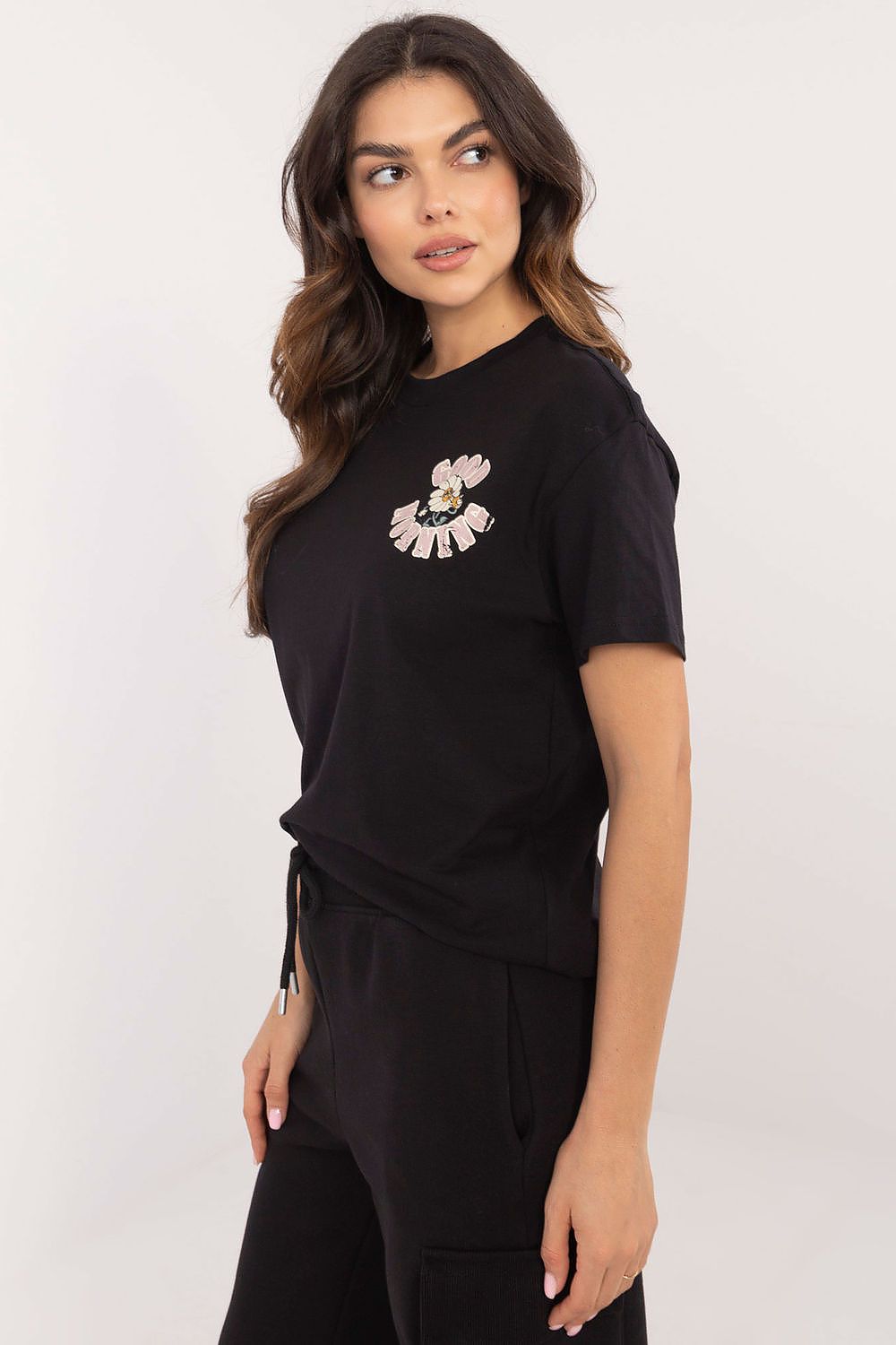Women's Black, Pink, and Green T-shirt side view