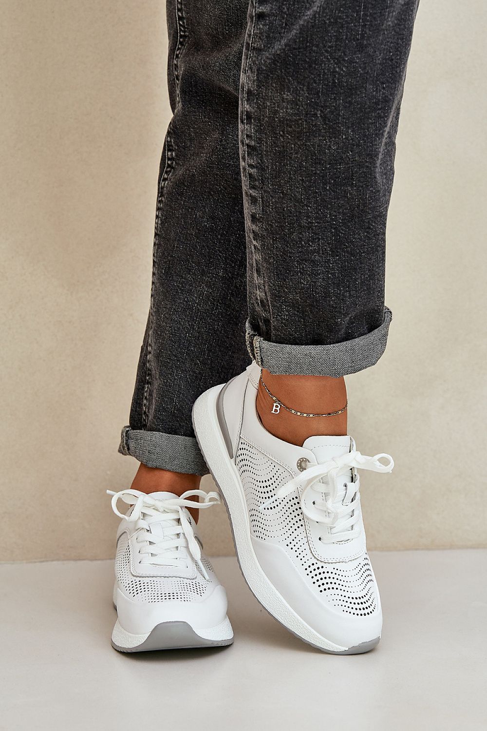 beige sport shoes back view