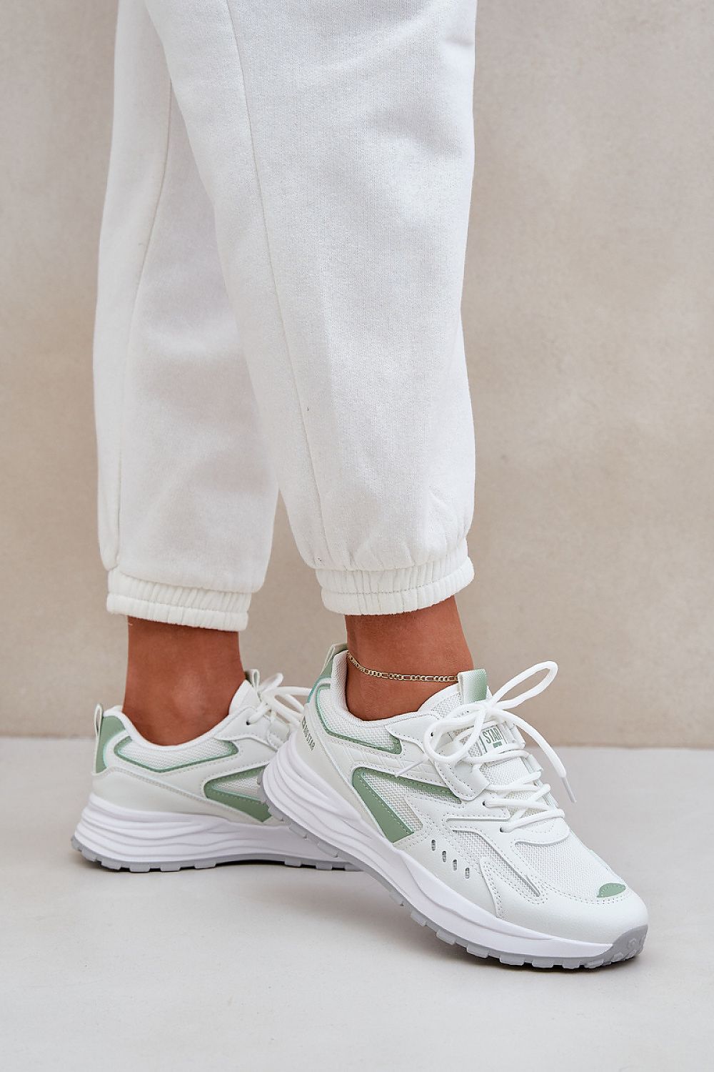 beige sport shoes view 6