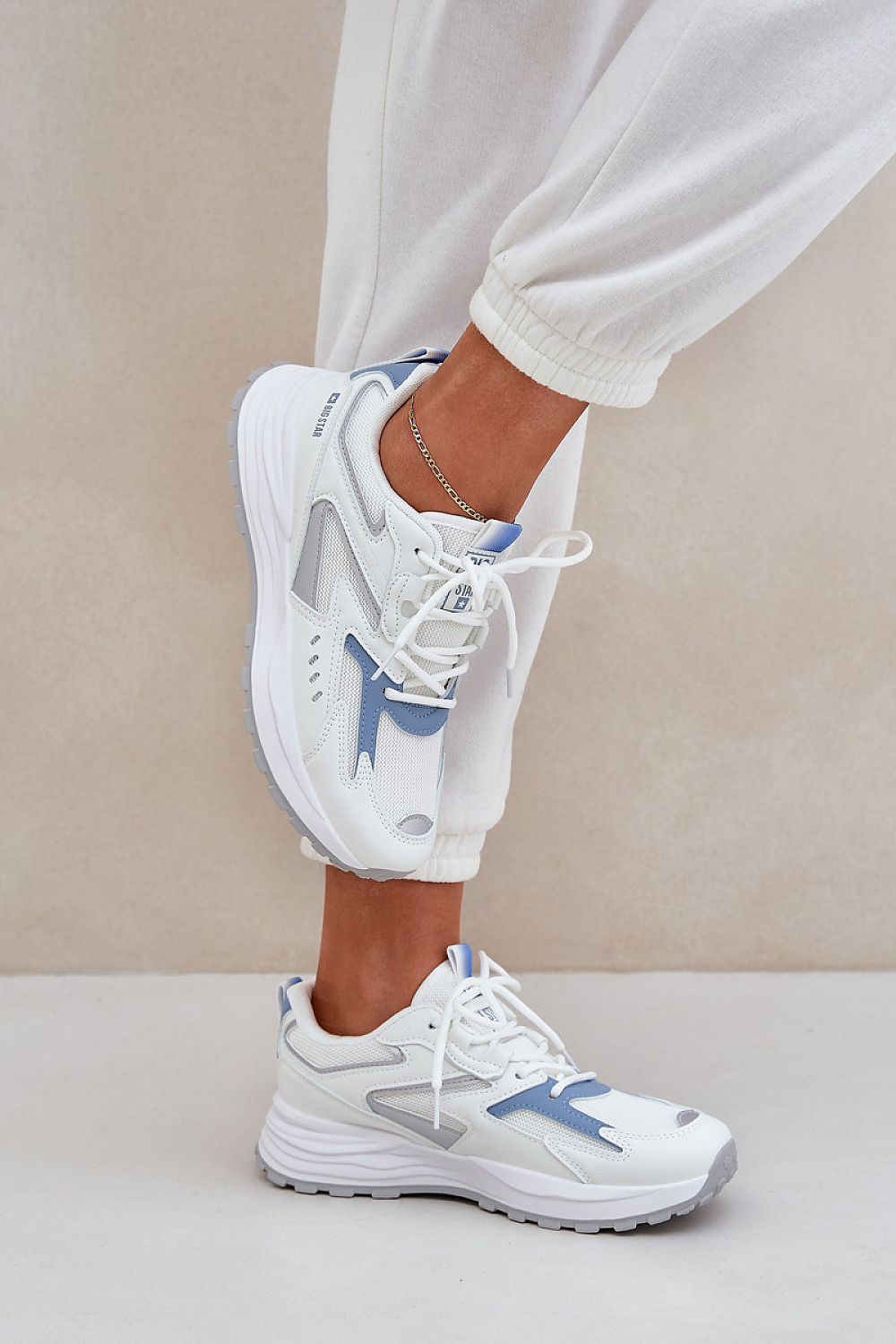 beige sport shoes view 7