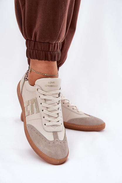 beige sport shoes detail view