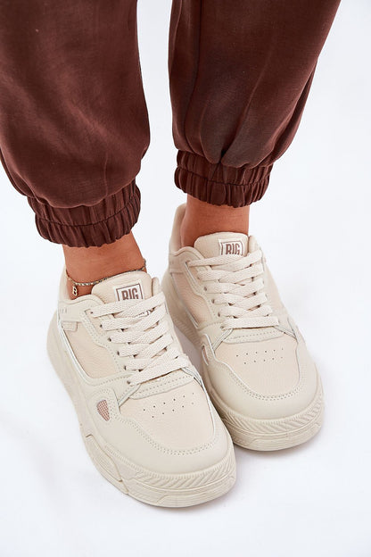 beige sport shoes detail view