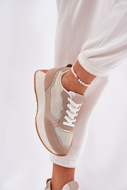 beige sport shoes detail view