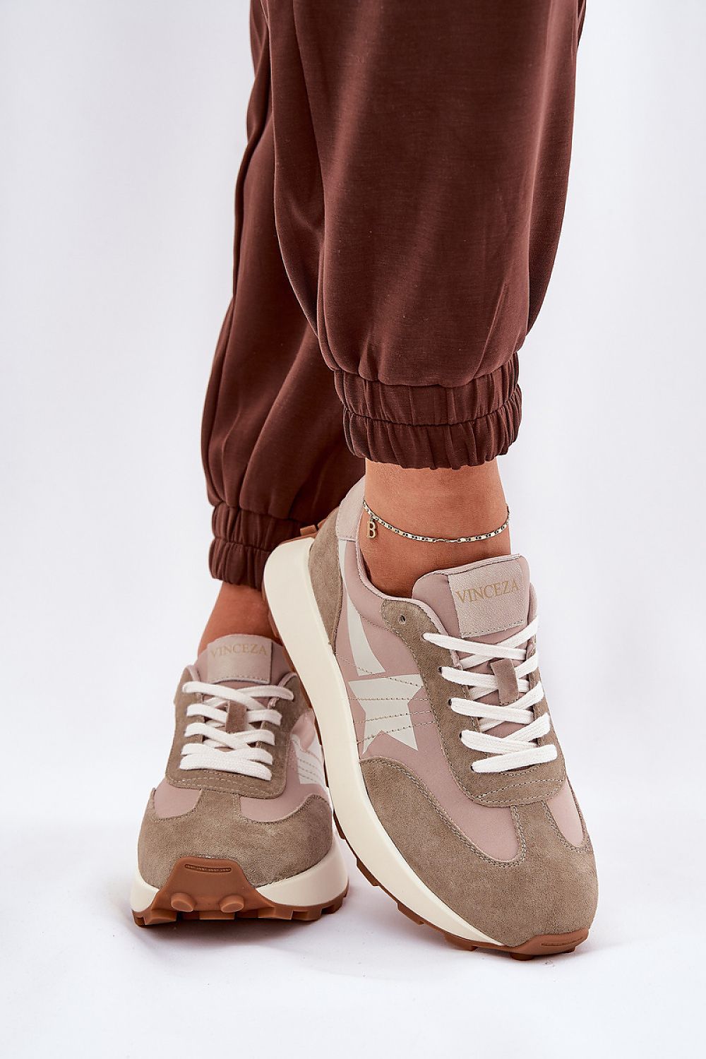 beige sport shoes detail view