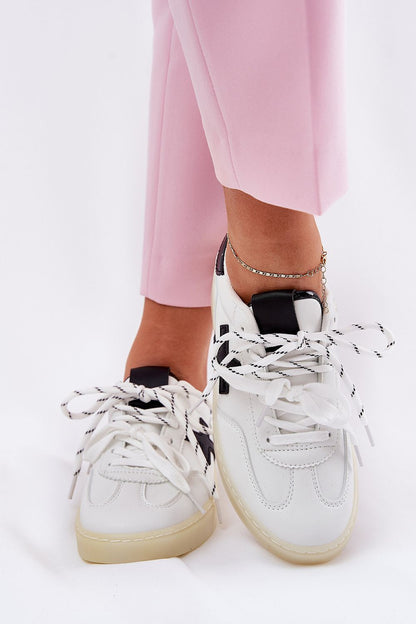 white sport shoes detail view