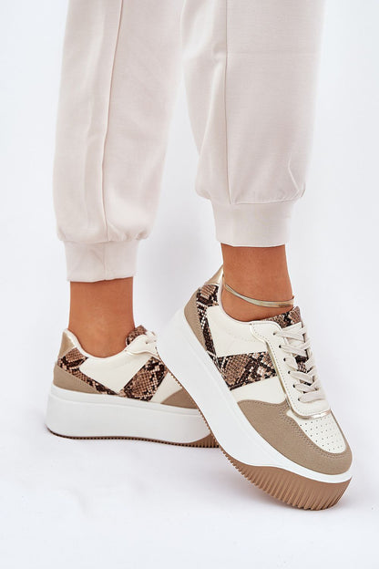 beige sport shoes front view