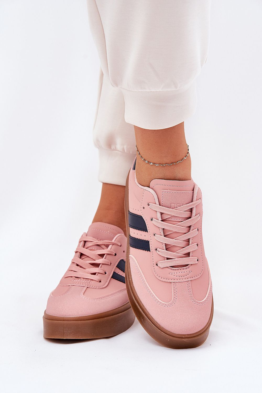 pink sport shoes front view