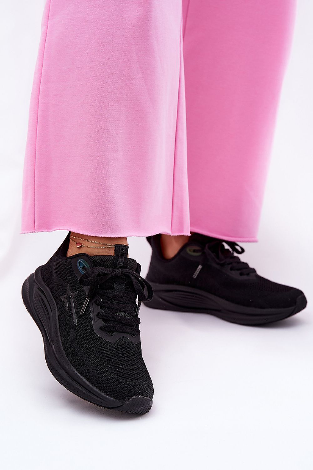 black sport shoes front view