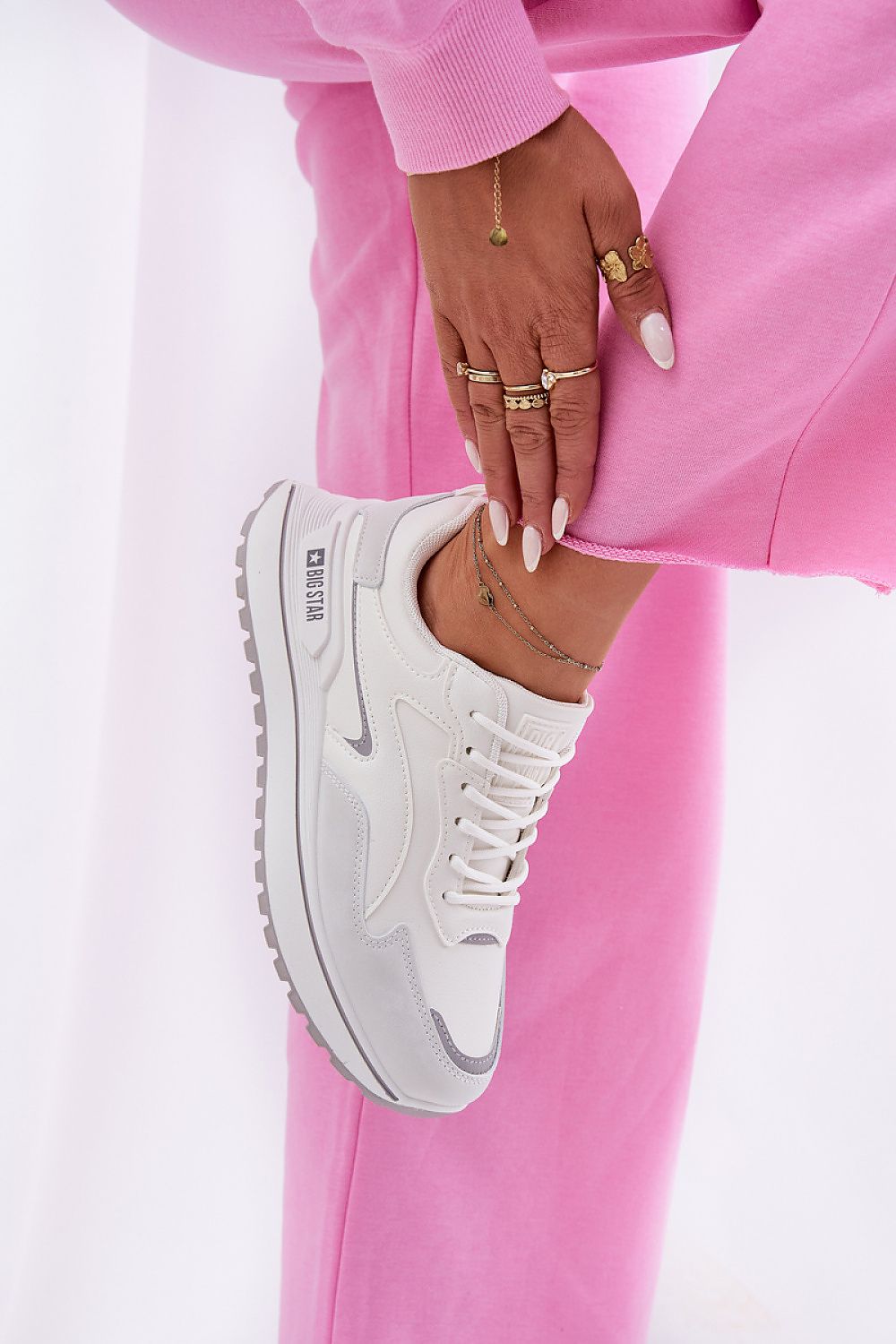 white sport shoes detail view
