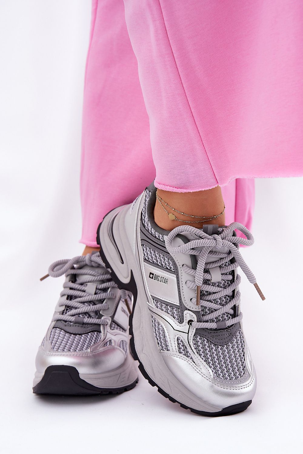 grey sport shoes front view