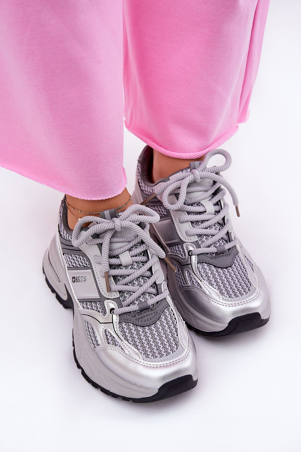 grey sport shoes detail view