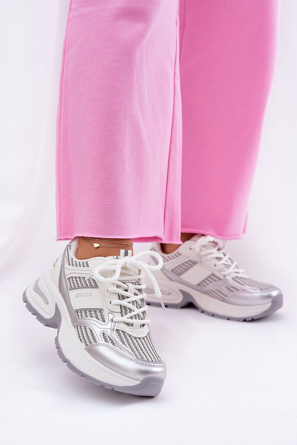 grey sport shoes back view