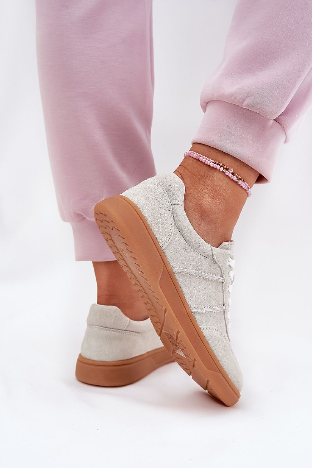 grey sport shoes detail view